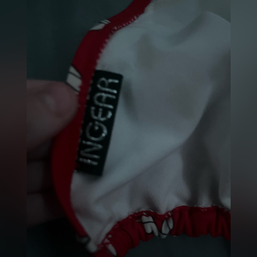 Red bikini top with ropes on it